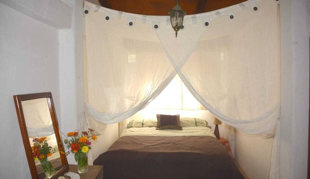 Arco Iris Farm surrounded by mountains and nature in the Sacred Valley Vilcabamba