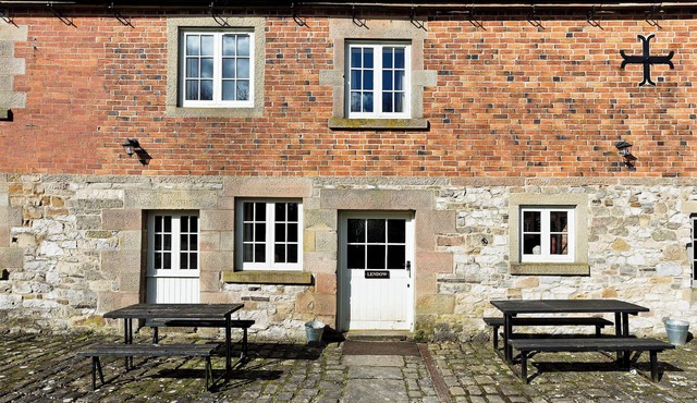 Attractive barn conversion set in three acres of shared grounds.
