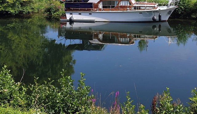 Atypical and cozy moored dutch boat on the Somme river