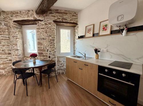 Authentic apartment in the center of the village