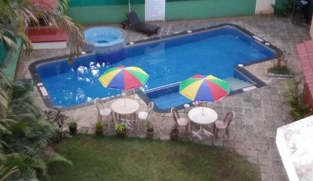 Authentic Goa Home Surrounded by Coconut Palm Trees & Pool at Sandray