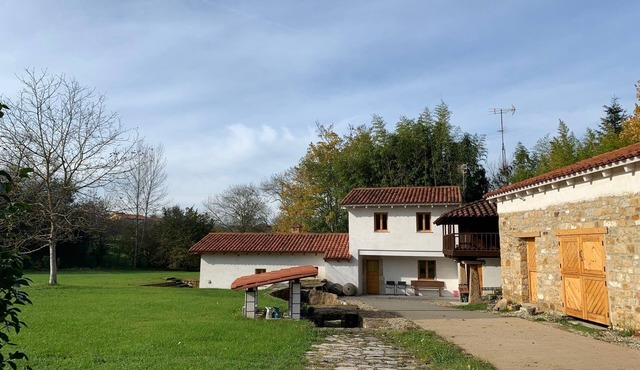 Awesome house with a improved water Mill and a large lawn.