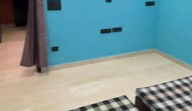 Babbu's Smart Residencies Blue Room