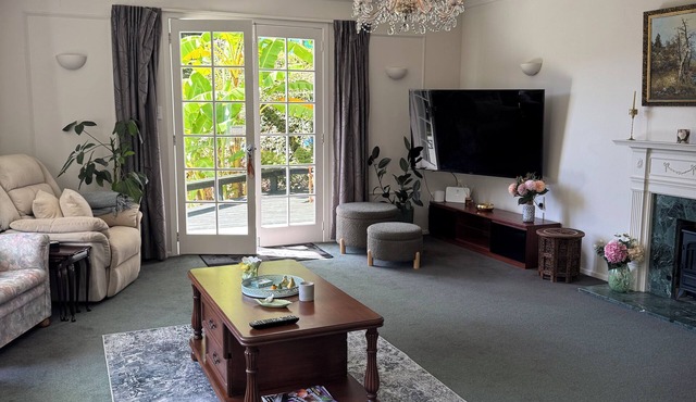 Backing on native bush yet 650m to the beach. Stunning spacious family home.