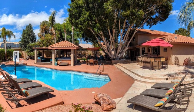 Backyard Oasis + 4 bedrooms. Close to stadium, baseball, golf, shopping