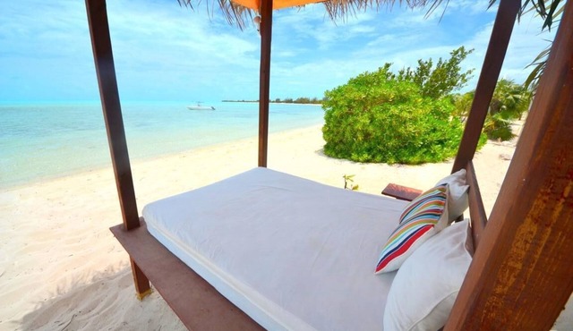 Barefoot Luxury – Silver Palms Cottage # 1, Beachfront with Pool on Long Bay
