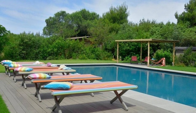 Beach Front Bibbona, an elegant 600 sqm villa with swimming pool surrounded by a beautiful garde.