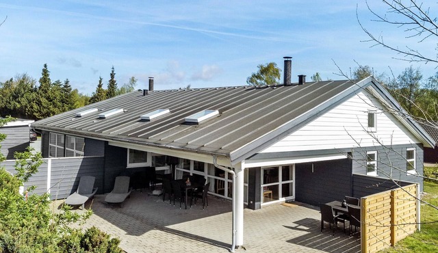 Beach front home in Væggerløse with sauna
