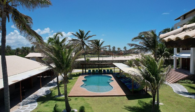 Beach front One Bedroom with Pool and Garden Views
