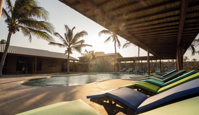 Beach front One Bedroom with Pool and Garden Views
