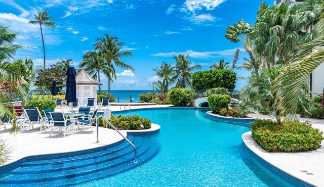 Beach Happy Beachfront Apartment by One Caribbean Estates
