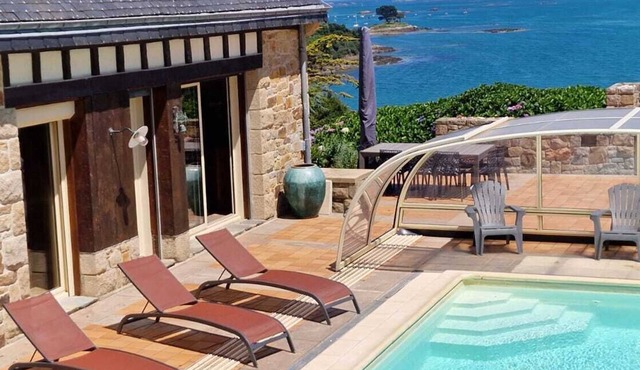 Beach view villa at the end of the garden covered swimming pool heated all year round