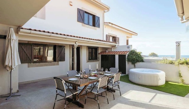 Beach Villa with Jacuzzi & Garage by HostWise