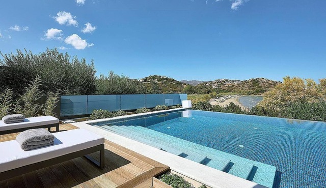 Beachfront 2 bedroom villa with a heated pool