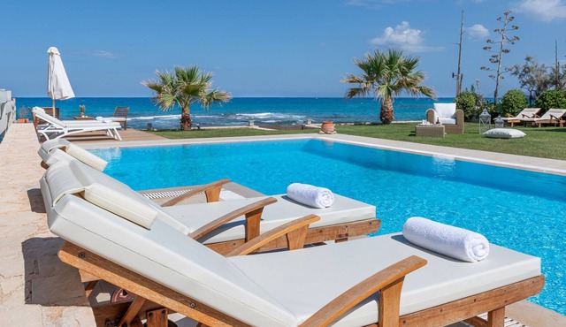 Beachfront 5 bedroom villa with a private heated pool