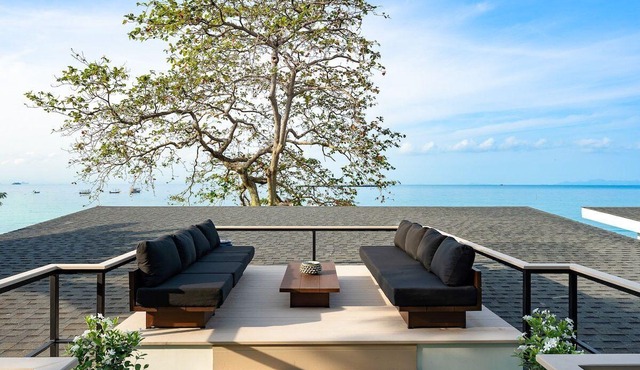 Beachfront 9BR Sunset Villas w/Staff & Saltwater Infinity Pools