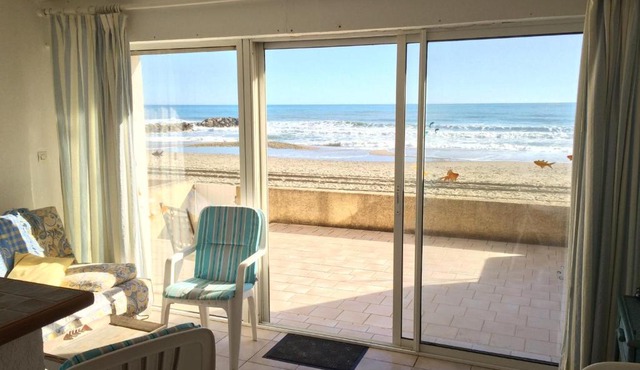 beachfront apartment with terrace and parking