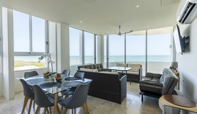 Beachfront apartment with private balcony, heated pool & stunning views