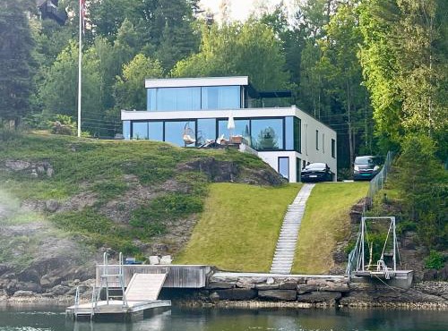 Beachfront apartment with private swimming dock