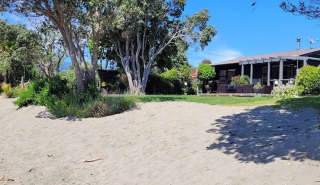 Beachfront Bliss - Your Parapara Seaside Sanctuary