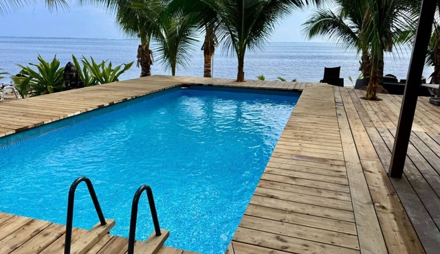 Beachfront Bungalows with Sunset Views in Haapiti