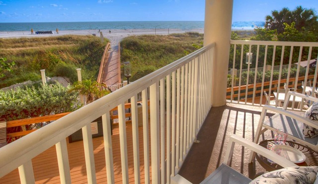 Beachfront condo at Sunset Vistas w/ heated pool, tiki bar, cafe, & gym. Sunset Views - Perfect!