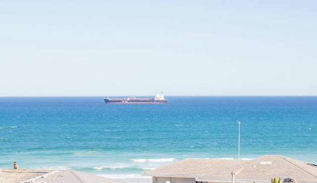 Beachfront couples paradise overlooking Robben Island and Atlantic ocean.