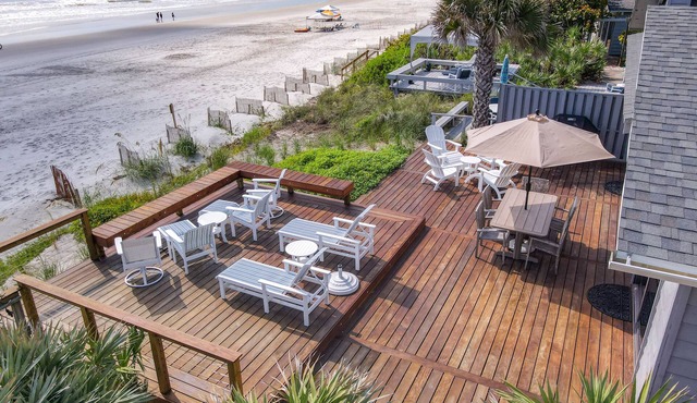 Beachfront Deck with steps down to the white sandy beach! Sea Dunes Sandcastle 1A