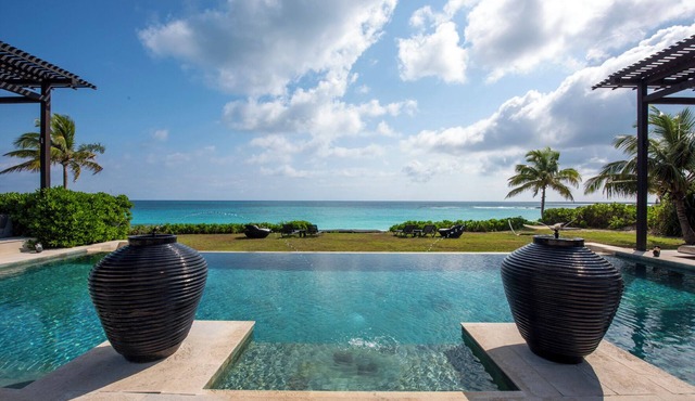 Beachfront Estate w/Htd Pool, Prime Banks Rd Location. Walk to Tippys!