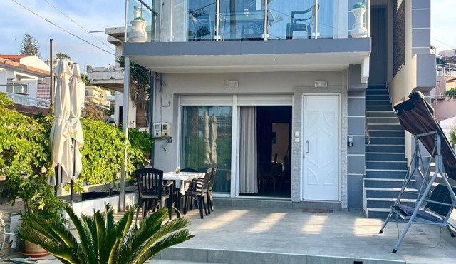 Beachfront Garden Villa by Interhome