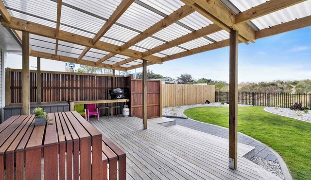 Beachfront Getaway with Modern Amenities-Comfort.