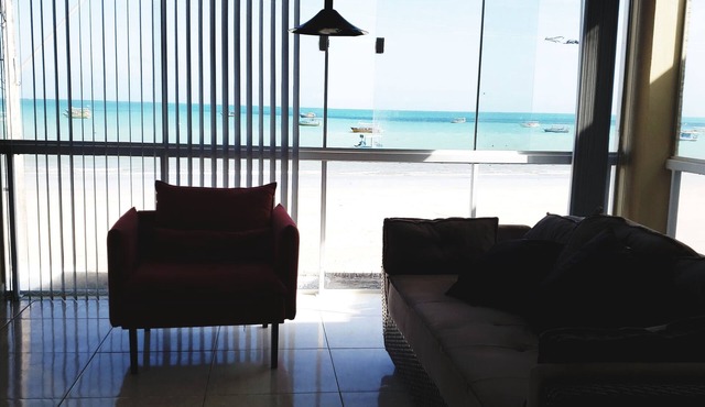 Beachfront house with 4 bedrooms, 3 bathrooms, barbecue area, swimming pool, and gourmet veranda.