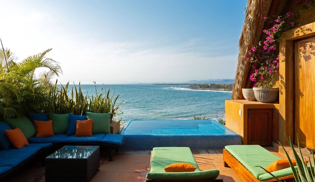 Beachfront, Laid Back Luxury Penthouse on Beautiful Manzanillo Bay Surf Break