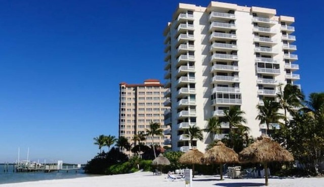 Beachfront Lovers Key condo with heated pool and private beach.