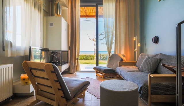 Beachfront Luxury. A Modern Maisonette with Breathtaking Views in Kalamitsi.