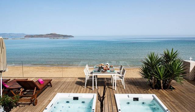 Beachfront luxury villa with hot tub & sunset view