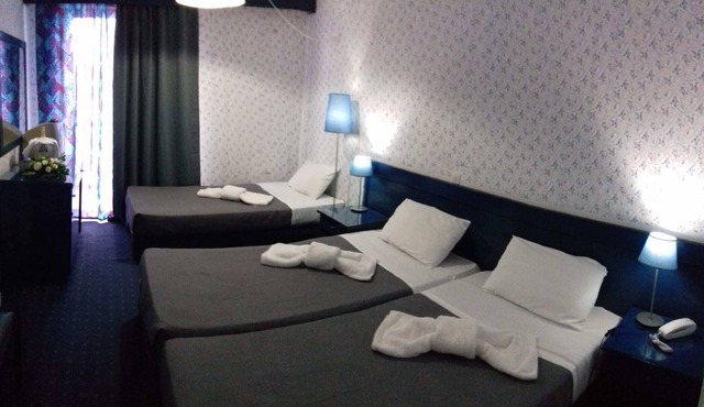 Beachfront Triple Room- Argo Seaside Stays