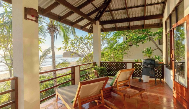 Beachfront villa 5 BR/4 BA, private pool, free parking, seconds from the beach