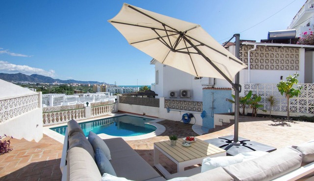 Beachfront villa for 6 in Nerja Punta Lara with private pool, sea and garden views. Mountain view