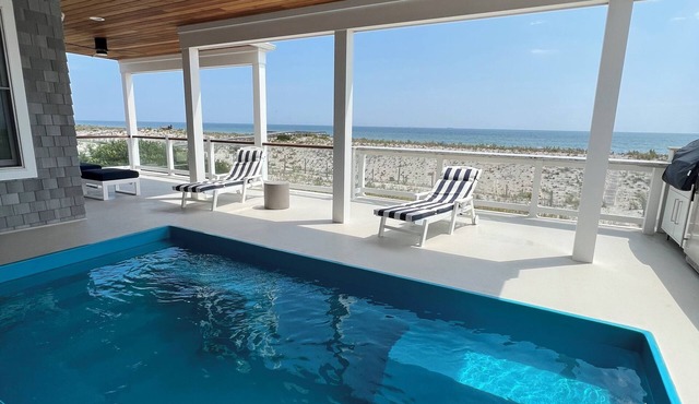 Beachfront with in-deck saltwater pool, panoramic views and private beach access