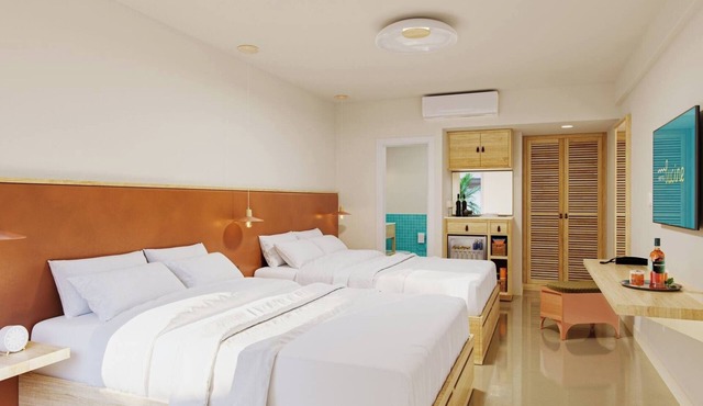 Beachside Balcony Room | Double Queens + Rooftop Drinks & Pool