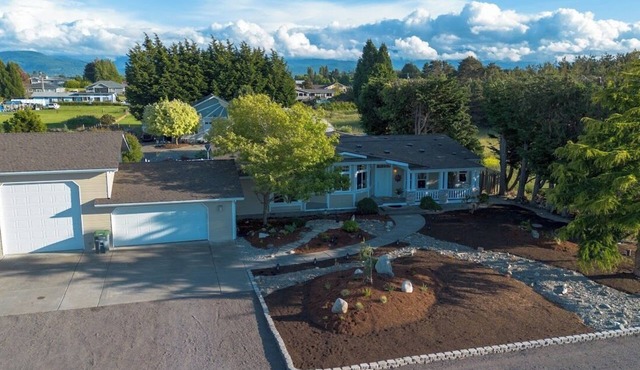 Beautiful and serene 4-bedroom home in sunny Sequim, feels like a warm hug!