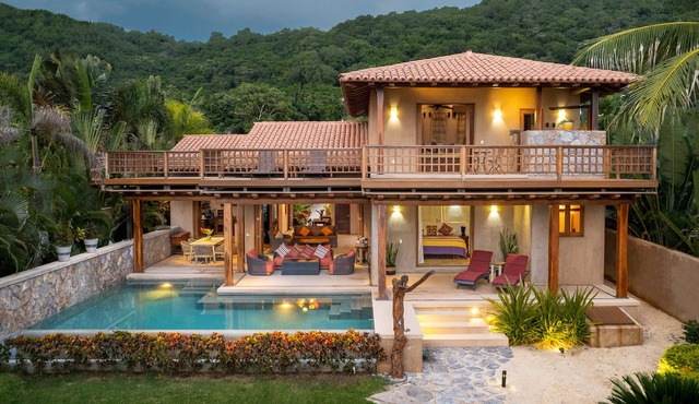 Beautiful Beach front home with 3 bedrooms and 3 1/2 bathrooms.