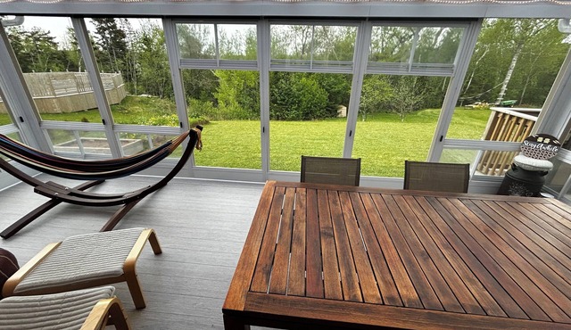 Beautiful home with enclosed sunroom
