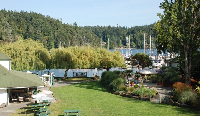 Beautiful modern cottage with fireplace and large deck at Currents at Otter Bay.
