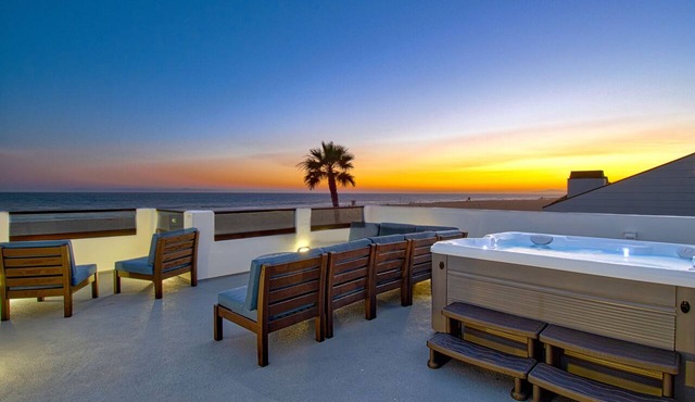Beautiful, one-of-a-kind upper unit with incredible roof-top deck with hot tub