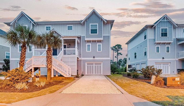 Beautiful & open home with enclosed porch, game room, W/D - beach & pool access