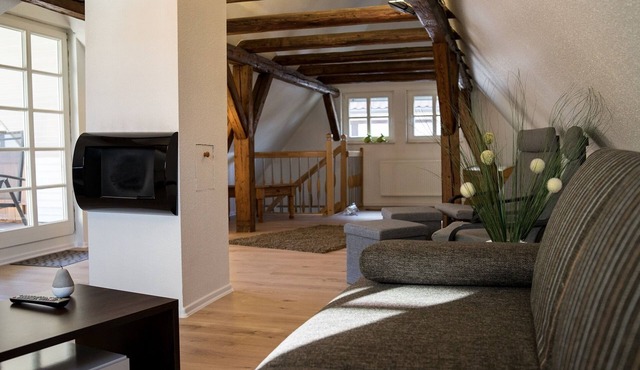 Beautiful timbered apartment with parking garage and roof terrace