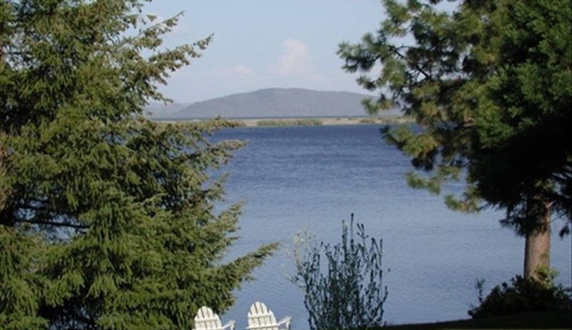 Beautiful view of the lake with patio and BBQ.