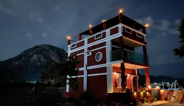 Beautifully designed Earthern home situated at the base of Skandagiri hills.
